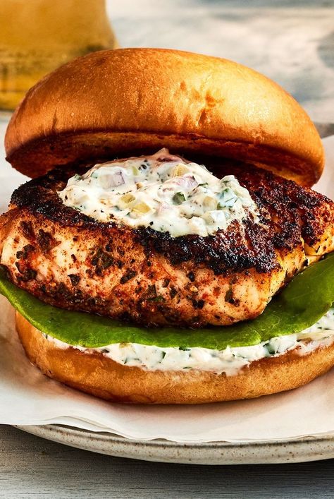 These Blackened Fish Sandwiches with Horseradish Tartar Sauce from Justin Chapple seared, spiced haddock fillets and a spicy dressing of homemade tartar sauce. Fish Sandwich Recipes, Fish Sandwiches, Resep Sandwich, Blackened Fish, Blacken Fish, Fancy Foods, Seafood Meals, Sandwhich Recipes, Resep Seafood