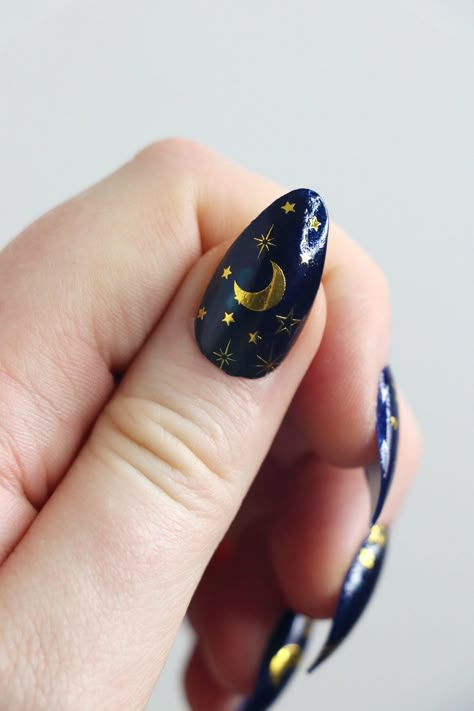 Create your own design with these gold stars and moon nail decals! SIZE: The size of the temporary nail tattoo sheet is 9,6 x 6,6 cm (3 4/5 inch x 2 3/5 inch). WHAT YOU GET: This listing is for one sheet of high quality temporary tattoo nail tattoos. Tattoorary offers high quality temporary nail tattoos. Application directions are included in your package. Celestial Nails Coffin, Moon And Star Nail Art, Crescent Moon Nail Art, Blue Nails With Gold Stars, Short Moon Nails, Moon Phase Nail Art, Acotar Inspired Nails, Starry Nail Designs, Stars And Moon Nails