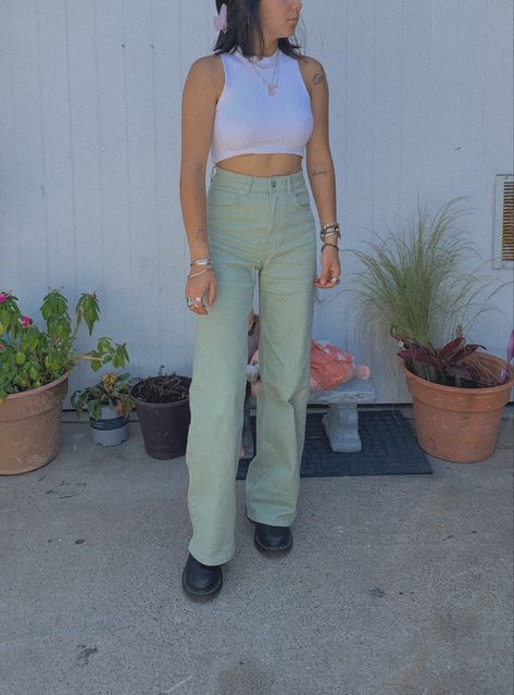 #mintgreen aesthetic #tattoo #flaredjeans #pastels #outfits #aestheticoutfits Pastel Green Jeans Outfit, Pastel Jeans Outfit, Mint Green Jeans Outfit, Light Green Jeans Outfit, Pastel Green Pants Outfit, Green Jeans Outfit Aesthetic, Green Pants Outfit Aesthetic, Mint Jeans Outfit, Light Green Pants Outfit