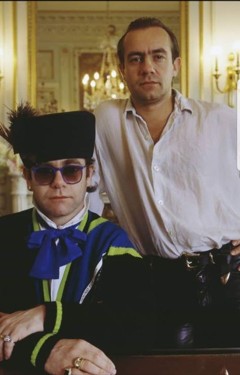 Elton John and Bernie Taupin by Terry O'Neill 1987 Elton John Outfits, Elton John Costume, Crocodile Rock, Bernie Taupin, Goodbye Yellow Brick Road, Terry O Neill, Captain Fantastic, Rocket Man, Candle In The Wind