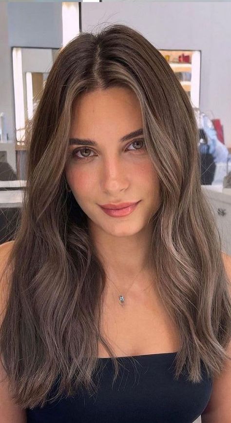 16. Ash Brown with Waves If you’re complaining about how hot the weather is right now, you probably can’t wait for the cooler weather. Who’s... Fall 2022 Hair Trends, Fall 2022 Hair, Mushroom Bronde, Highlights 2022, 2022 Hair Trends, Hairstyles Balayage, Balayage Brown, Haircuts Blonde, Long Hair Trends