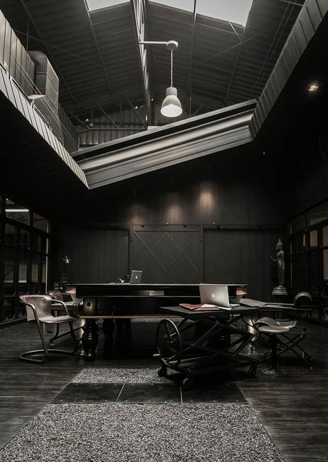 S Construction Offices In Bangkok, Thailand, by Metaphor Design Studio | http://www.yatzer.com/s-construction-metaphor-bangkok photo © Nuttee Thongjang. Tilted Ceiling, Metaphor Design, Industrial Office Space, Black Interior Design, Dark Home, Dark Interiors, Commercial Design, Beautiful Space, Black Interior