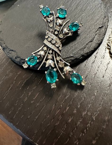 "Trifari Sterling RARE Brooch-Emerald and Diamond paste in an innovative Artistic early design.  Condition is very good, safety catch works, any slight wear commensurate with age, all stones present-photos show the details.  Size approx. 2 1/2\" by 1 1/2\", wt. - 18 grams.  Over the top elegant design sure to enhance any outfit when worn." Mertensia Virginica, Enamel Flower, Over The Top, Emerald Diamond, Vintage Costume Jewelry, Vintage Costumes, Vintage Brooches, Sterling Silber, Costume Jewelry