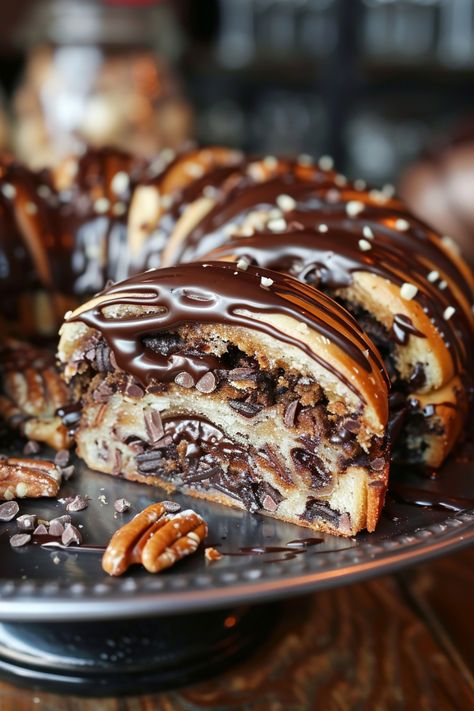 Chocolate-drizzled Bundt cake with pecans and chocolate chips on a dark plate. Chocolate Filled Bread, Chocolate Buns Recipe, Babka Recipe Easy, Babka Photography, Babka Bread Recipe, Chocolate Bun Recipe, Babka Recipes, Babka Buns, Chocolate Babka Recipe