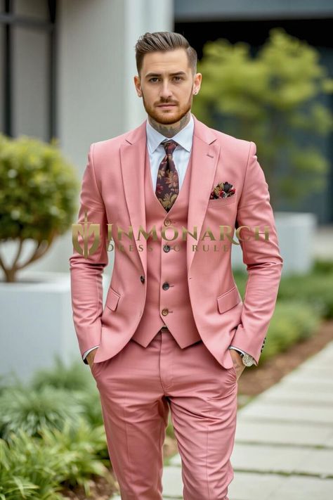 A dusty rose three-piece suit, featuring a blazer, vest, and tailored trousers. Paired with a white shirt, floral tie, and matching pocket square. Includes jacket, vest, and pants; additional accessories are extra. Crafted from luxurious polyester blend fabric for a sleek look and comfort. Perfect for weddings and special events. Dry clean only. Made in India. Pink Suits, Mens Dress Vests, Mens Tunic, Blazer Wedding, Vest And Pants, 2011 Fashion, Safari Shirt, Linen Tunic Dress, Dusty Rose Pink