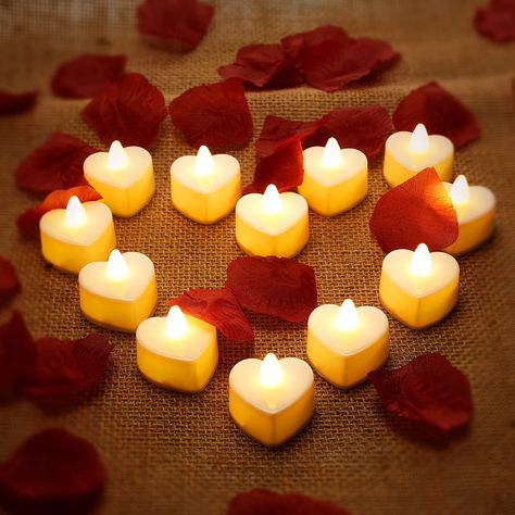 PRICES MAY VARY. Adequate quantity: you will get 200 pieces realistic and gorgeous silk rose petals and 12 pieces heart shape LED candles, adequate quantity for you to create your own romantic surrounding and spend a wonderful night with your dear Heart shape LED tealight candle: our romantic tealight candles are designed in heart shape, they are beautiful and the nice substitute of real candle; Tealight in heart shape with bright light and dark red rose petals can easily bring you romantic atmo Wedding Night Room Decorations, Battery Tea Lights, Led Tea Light Candles, Heart Shaped Candles, Fake Candles, Silk Rose Petals, Electronic Candles, Hari Valentine, Red Rose Petals