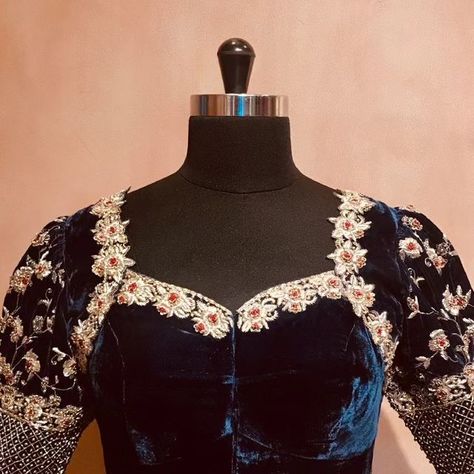 BlouseHousebyMahithaPrasad on Instagram: "Discover majestic grandeur with unparalleled regal charm in this Navy Blue Velvet Blouse from our Evident Doses of Handcraft collection. Velvet fabric, which is a true testament to power and wealth, gives the blouse unmatched comfort. It flaunts Cutedge Floral Embroidery on the shoulders and neckline. Floral Creepers bedeck the puffed sleeves, complemented by Check-Patterned Embroidery on the sleeve border. Starting at INR 10,000 only, these luxuriou Navy Blue Velvet Blouse, Blue Velvet Blouse, Velvet Blouse, Navy Blue Velvet, Unique Blouse Designs, Unique Blouse, Velvet Blouses, Puffed Sleeves, Creepers