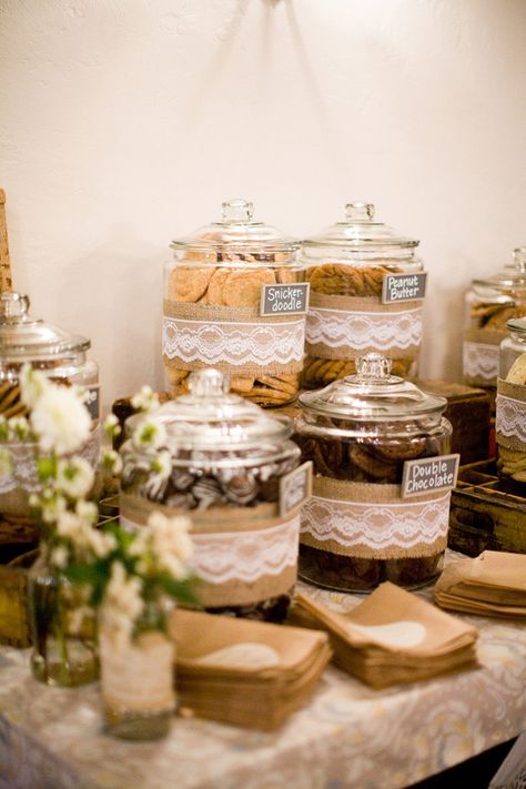 Pretty empty glass jars arranged on a table for guests to add their cookies to. #holidayentertaining Hessian Wedding, Table Coverings, Bar A Bonbon, Deco Champetre, Cookie Bar, Wedding Buffet, Festa Party, Santa Barbara Wedding, Burlap Wedding