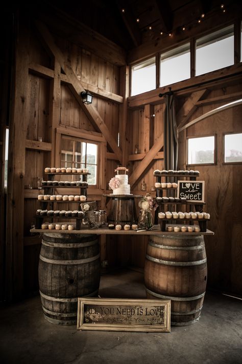 what a creative display for all of those yummy cupcakes!  Photography: Trinity Wheeler Photography - www.trinitywheelerphotography.com  Read More: http://www.stylemepretty.com/california-weddings/2014/03/29/rustic-romance-at-hammersky-vineyards/ Rustic Romance, Wine Barrels, Rustic Fall Wedding, Country Theme, Wedding Cake Rustic, Rustic Barn Wedding, Rustic Country Wedding, Western Wedding, Wedding Cupcakes