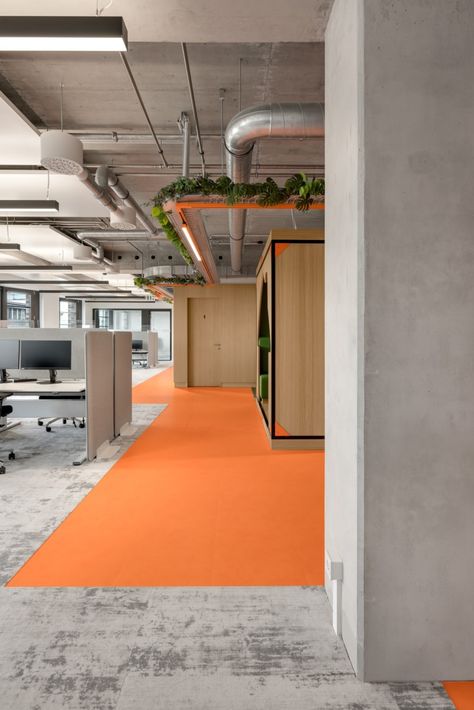 Fun Office, Concrete Column, Orange Carpet, Corporate Office Design, Office Tower, Office Floor, Just Eat, Office Layout, Office Plants