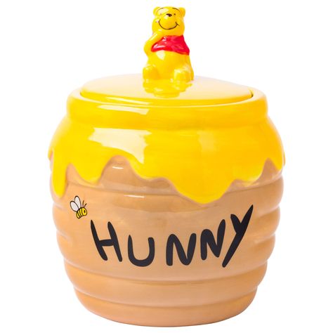 PRICES MAY VARY. COOKIE JAR: Store your cookies and other sweets in this adorable Winnie the Pooh Small Sculpted Ceramic Snack Jar that looks like Pooh's Hunny Pot. Features Winnie the Pooh on top of the lid FRESH: The snack jar lid is remove-able with an air-tight gasket to keep baked goods fresh CONSTRUCTION: The snack jar is constructed from BPA-free and toxin-free ceramic and measures 6.5 inches tall by 4.5 inches diameter ONE OF A KIND: Each one is hand painted and it may have slight design Hunny Pot, Pot Cookies, Winnie The Pooh Honey, Ceramic Cookie Jar, 3d Hand, Food Patterns, Snack Jars, Cookie Gifts, Honey Jar