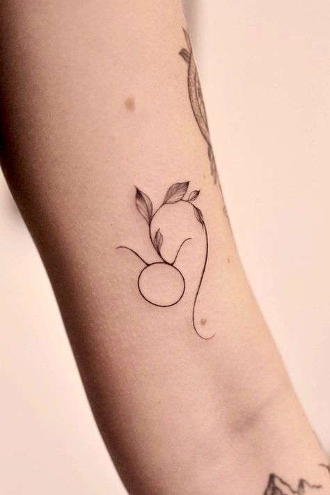 25 Best Taurus Tattoo Ideas - Meaning & Design Guide Simple Taurus Tattoo For Women, Taurus Tattoo For Women Pretty, Zodiac Tattoos Taurus, Taurus Minimalist Tattoo, Taurus Tattoo For Women, Taurus Tattoo Ideas, Taurus Symbol Tattoo, Tattoo Taurus, Wrap Around Wrist Tattoos