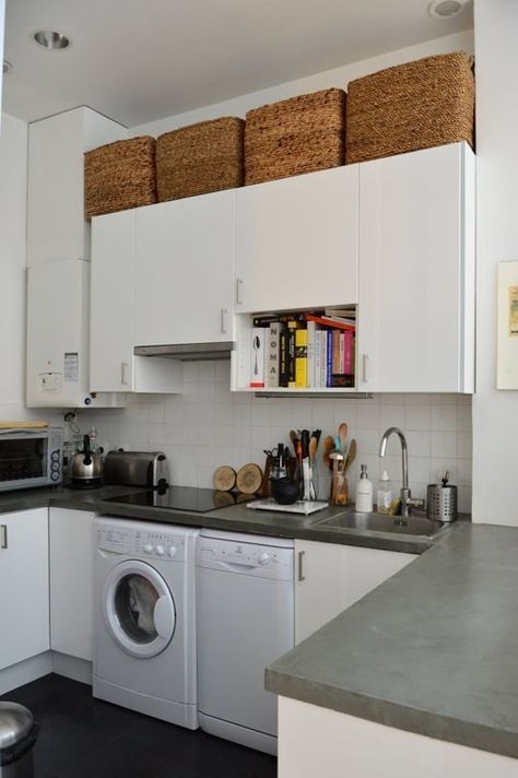 Wicker baskets can work, too. | 17 Ways To Squeeze A Little Extra Storage Out Of A Tiny Kitchen Above Cabinet Storage, Storage Above Kitchen Cabinets, Dishwasher Liquid, Top Of Kitchen Cabinets, Small Space Inspiration, Tiny Kitchen Design, Paris Kitchen, Above Kitchen Cabinets, Above Cabinets