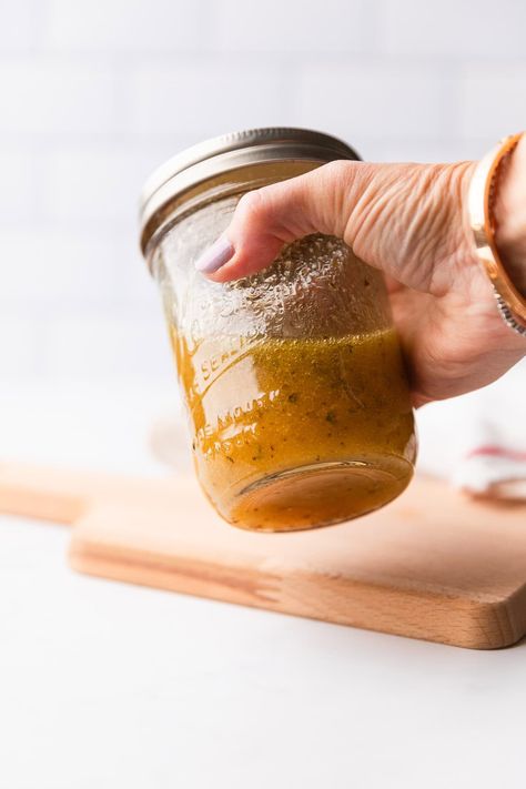 This Cava Greek Vinaigrette is going to become your go to salad dressing! It's made with red wine vinegar, extra virgin olive oil, and a Greek inspired spice blend that will have your taste buds tingling. It whips up in minutes and is great on more than salads! Cava Salad Dressing, Cava Greek Vinaigrette, Venigret Salad Dressing, Cava Salad, Cava Recipes, Cava Copycat, Greek Vinaigrette Dressing, Martini Recipes Classic, Mexican Macaroni Salad Recipe