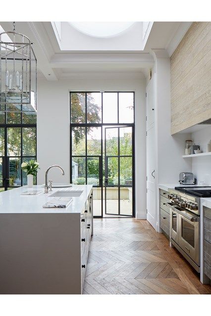 Bright Modern White Kitchen - An open-plan layout full of intriguing design details in this Victorian house at Oxford - kitchens on HOUSE by House & Garden. Kitchen Dining Living Room Layout Floor Plans, Modern Victorian House, Replace Windows, Decor Ikea, Modern Kitchen Interiors, Black Door, Modern Victorian, Scandinavian Kitchen, White Modern Kitchen