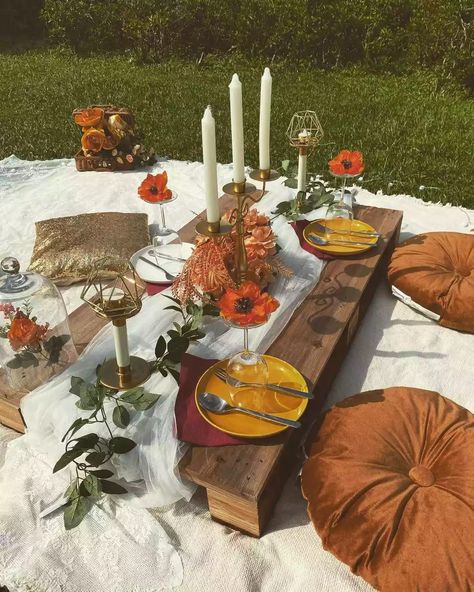 For an outdoor gathering that's for just a few, bust out the picnic blankets. But this isn't the picnic of your childhood—use candles, elegant server ware, and plush cushions for an upscale vibe. We love this earthy, boho picnic aesthetic but you can match your picnic decor to your vibe! #PicnicAesthetic #BohoPicnic #PicnicAestheticIdeas #MyDomaine Fall Picnic, Picnic Decorations, Garden Picnic, Party Setup, Outdoor Birthday, Boho Picnic, Outdoor Party Decorations, Picnic Party, Small Patio