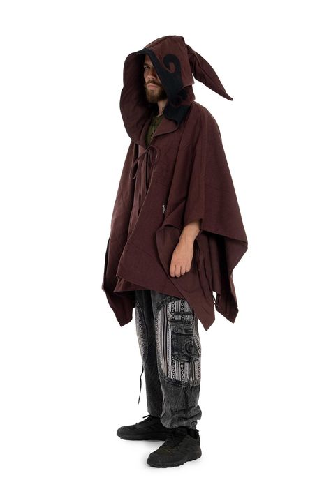 This cosy mens poncho has a great big wizard hood, perfect for LARP, cosplay and festivals. Made from thick cotton canvas and lined with fleece. One size fits all. THIS LISTING IS FOR BROWN Also available in Black or Army Code: POTTER PONCHO (MPH001) Wizard Costume Male, Wizard Outfit Design Male, Wizard Clothing, Wizard Clothes, Modern Wizard, Goth Fashion Men, Wizard Outfit, Wizard Fashion, Solarpunk Fashion