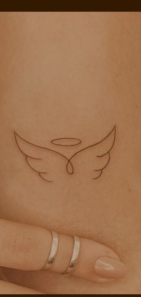 Angle Halo Tattoo, Angel Wing Tattoo On Ribs, Angel Tattoo Minimalist Simple, Simple Angle Tattoos, Small Dainty Angel Wing Tattoo, 11:11 Tattoo Angel Wings, Aesthetic Angel Wings Tattoo, Angel Wings Behind Neck Tattoo, Simple Angle Wings Tattoo