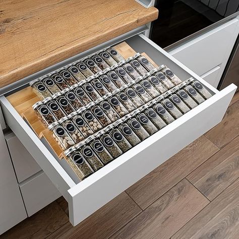 Bamboo Spice Rack Tray - 64 Jars Spice Drawer Organizer for Kitchen Cabinets Storage and Organization  I love this item! it has helped me keep all of the clutter away instead of fighting with so many spice jars I go crazy or accidentaly buy duplicates