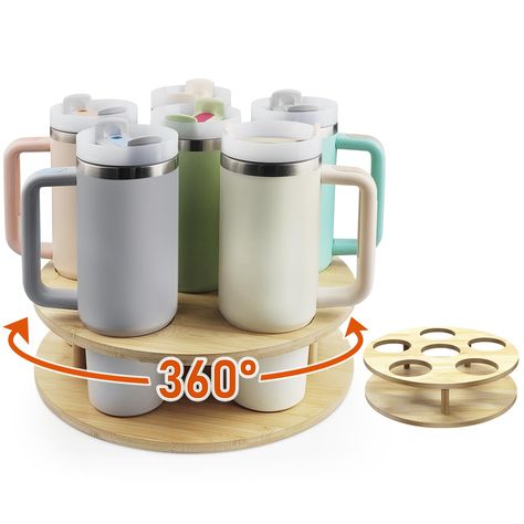 PRICES MAY VARY. Wide Compatibility:The tumbler organizer is specially designed for Stanley water bottles, it can hold up to six 40 oz bottles, not only is it compatible with 40/30/20/14 oz stanley water bottles, but also some Yeti bottles, Owala bottles, thermos bottles, etc., and it can also be used as a wine rack in the kitchen and wine cellar Rotatable Design:Water bottle storage features a rotatable design, whether you store it in a cabinet or on your kitchen countertop, this practical bott Tray With Water Bottles, Water Bottle Holder Cabinet, Beer Mug Storage, Yeti Tumbler Storage, Tumbler Cup Shelf, Starbucks Tumbler Cup Storage, Water Bottle Desk, Kitchen Storage Water Bottles, Glass Water Bottle Storage