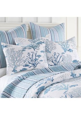 The Lacey Sea Reversible King/Cal King Quilt Set by Levtex Home is inspired by a snorkeling trip on a gorgeous coral reef. This intricate coral design will immediately transform your bedroom. Made with the softest lightweight cotton, this reversible quilt features a fish and coral in shades of blue on an off white ground, reversing to a blue and white stripe on the other. The King/Cal King Quilt Set is machine washable and includes the quilt (106x92in.) and two king pillow shams (36x20in. ) Enjo Beach Master Bedrooms Decor, Coastal Bedrooms Bedding, Bedspread Ideas, Beachy Bedding, Beach House Bedding, Coastal Bedding Sets, Beachy House, Coastal Room Decor, Beach Bedding Sets