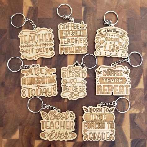 Give your teacher some love this school year with one of our cute, wooden keychains. Choose between 8 different teacher sayings. These make great teacher appreciation gifts for back to school, Christmas time, or even end of school gift. Each teacher wooden keychain is approx. 2.25 inches wide by 2.25 long. Teacher Sayings to Choose from: "Teacher Off Duty" "Coffee gives me Teacher Powers" "Livin' That Teacher Life" "Be Awesome Today" "Blessed Teacher" "Coffee Teach Repeat" "Best Teacher Ever" "B Wooden Teacher Gifts, Teacher Sayings, Photo Album Gift, Laser Cut Wood Crafts, Social Media Advertising Design, Laser Ideas, Teaching Teachers, Wood Keychain, Wooden Keychain