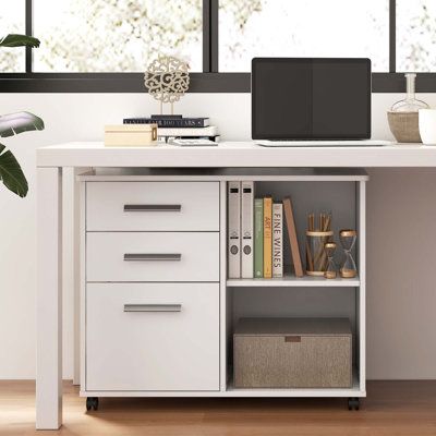 Experience optimal storage capabilities with our spacious lateral filing cabinet. The wide tabletop offers ample room for organizing your office essentials. There are 2 small drawers are perfect for storing small items. Additionally, the large drawer at the bottom provides a hanging system for letter size folders, ensuring efficient organization. Furthermore, the open shelves with 3-level positions add versatility. It is not only a file cabinet but also a versatile piece that can be used as a ni 3 Drawer File Cabinet, Drawer Filing Cabinet, Printer Stand, Lateral File Cabinet, Hanging Bar, Office Essentials, Small Drawers, Accent Cabinet, Large Drawers