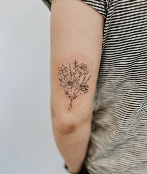 Back Of Arm Birth Flower Tattoo, Bouquet Tattoos For Women, Flower On Back Of Arm Tattoo, Tattoo Ideas Flower Bouquet, Flower Bouquet Tattoo Upper Arm, Back Of Arm Bouquet Tattoo, Flower Bouquet Tattoo Bicep, Floral Bouquet Tattoo Forearm, Butterfly Flower Bouquet Tattoo