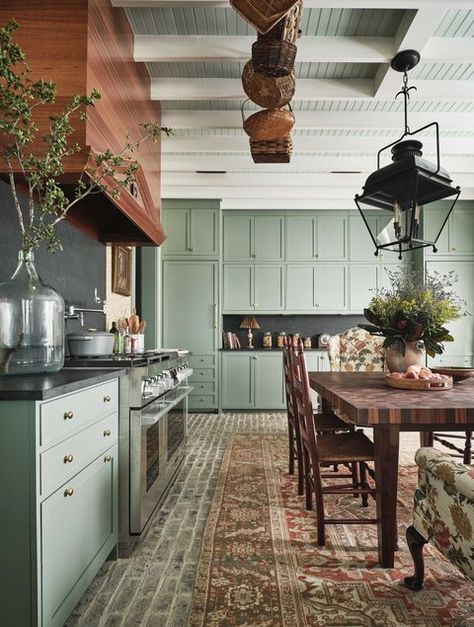 Smoky green cabinetry partners beautifully with a brick floor in this designer kitchen... #lovewhereyoulive #happyhouse #farrowandball #verticalshiplap #woodbacksplash #wingchair #formaldining #openshelves #traditionalliving #traditionalstyle Brick Floor Kitchen, Green Kitchen Designs, Modern Parisian, Kitchen Suite, Brick Kitchen, Condo Ideas, Casa Vintage, All White Kitchen, Farmhouse Kitchen Design