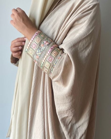 Beige Abaya with embroidered sleeves #abaya #fashion #modestfashion #modestclothing #abayadubai #abayastyle ##ootd #abayaoutfit #hijabers #fyp Pastel Abaya, Beige Abaya, Embroidered Hijab, Abaya Outfit, Embroidered Sleeves, Abayas Fashion, Abaya Fashion, Modest Outfits, Modest Fashion