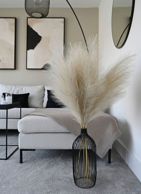 The Tall Nala Outline Vase in black makes a stunning statement and is perfect for our tall faux pampas. The sleek, slim shape of the vase gives height to any room and looks great stood on the floor or as a centrepiece. The contemporary design is ideal for any modern, minimalist home. #a #Ideas #InteriorInspo #Elevate #Stylish #and #Living #Space #HomeDecorating #Your #Living #Inviting #Inspiring #DecorInspiration #Room #DecorTips #for Living Room Decor Pampas, Black Floor Vase With Pampas, Black Large Vase, Pampas Grass Living Room Decor, Pampas Room Decor, Modern Accessories Home, Pampas Grass Black Vase, Black White Neutral Home Decor Living Room, Fireplace Vases Decor