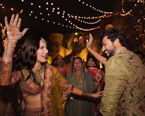 #Exclusive - Haldi & Mehendi ceremonies pictures of Newly wed B-Town couple Katrina Kaif & Vicky Kaushal. from Sabyasachi wedding outfits to beautiful couple portraits, these wedding photos are must seen. #shaadisaga #indianwedding #celebritywedding #bollywoodwedding #indiancelebrityweding #sabyasachilehenga #redsabyasachilehenga #bridalsabyasachilehenga #katrinakaifandvickykaushalwedding #katrinakaifandvickykaushalweddingpictures #katrinakaifandvickykaushalmarriage #katrinakaiflehenga शादी की तस्वीरें, Mehndi Outfit, Vicky Kaushal, Mehndi Ceremony, Wedding Diary, Haldi Ceremony, Bollywood Wedding, Couple Dancing, 2022 Fashion