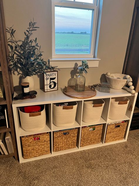 Perfect place to store all our board games. 16 Cube Shelf Decor, Board Game Storage Basement, Living Room Cubby Decor, Board Games Storage Living Room, 8 Cube Storage Ideas, Board Game Corner In Living Room, Cubical Storage Ideas Cube Organizer, Storage Cubes Bedroom, Cute Cubby Ideas