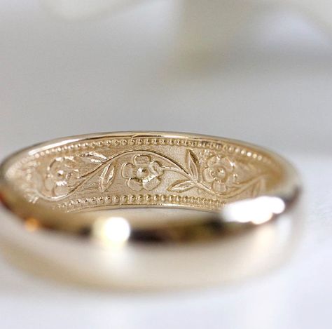 This 14k yellow gold ring is 6mm wide and domed on the outside. It features my petunia pattern on the inside. The five-petaled flowers and their leafy vine weave their way around the band. This is a great traditional band on the outside made to match a companion ring with the same pattern outside.  It's a great ring for everyday wear. A wonderful, heirloom-quality wedding band that can one day be passed down to the next generation. Also available in 14k rose gold and 14k white gold. Please note, Ring With Flowers, Floral Wedding Band, Sakura Wedding, Romantic Wedding Rings, Non Traditional Wedding Ring, Traditional Wedding Rings, Floral Wedding Ring, Floral Wedding Bands, Flower Wedding Ring