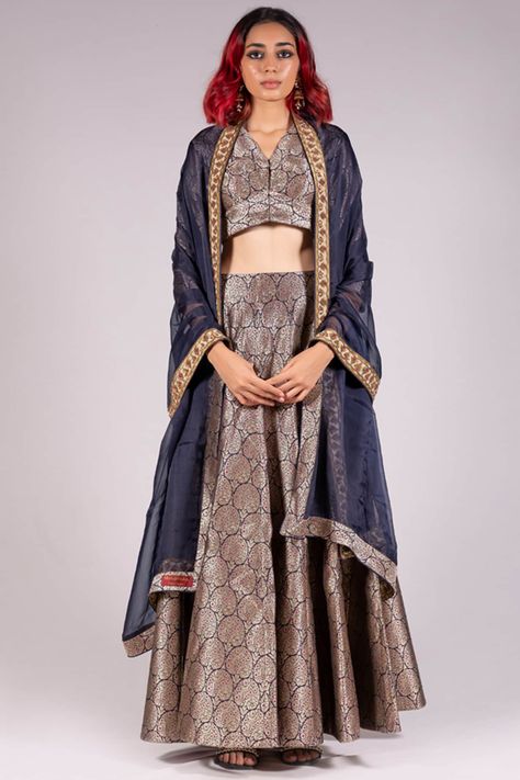 Featuring a navy blue lehenga in handwoven jamawar silk brocade base. It is paired with a matching blouse and an organza embroidered dupatta.  FIT: Fitted at bust and waist. COMPOSITION: Handwoven jamawar silk brocade, Organza. CARE: Dry clean only. Navy Blue Lehenga, Brocade Lehenga, Blue Lehenga, Embroidered Dupatta, Wedding Lehenga, Silk Brocade, Indian Fashion Designers, Pop Up Shop, Blue Blouse