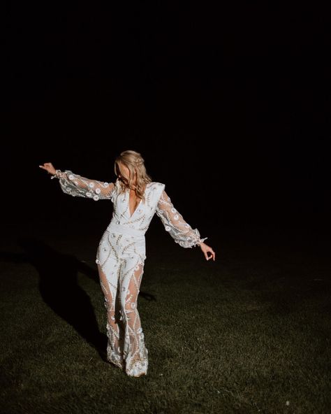 Brides, take note: If you're planning on an outfit change for your reception, you simply cannot go wrong with a statement jumpsuit! Bride Outfit Change, Reception Jumpsuit, Statement Jumpsuit, Midcentury Boho, Reception Shoes, Boho Lighting, Romantic Proposal, Boho Style Wedding, Bridal Jumpsuit