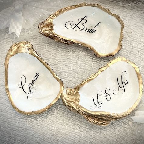 Oyster Shell Place Cards, Wedding Place Cards, Oyster Place Cards, Oyster Wedding Favor, Wedding Place cards, Wedding Decor, Pearl Wedding Handmade gifts for all of life’s special occasions. Shop on our Etsy link below https://www.etsy.com/shop/tidesoftimedesigns Custom Oyster Shell Mother of The Bride with Wedding Date - Thoughtful Gift for the Moms - Mother of the Groom - Step Mom, bridesmaids, bridal party, wedding rehearsal dinner guests, and more. ❤️Thank you for looking and hope we... Shell Wedding Favors, Oyster Shell Wedding, Oyster Shell Place Cards, Oyster Wedding, Shell Place Cards, Place Cards Wedding, Dinner Guests, Step Mom, Dinner Guest