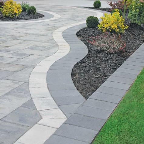 Drive up to your home in style with a beautiful Nicolock driveway! #outdoor #driveway #nicolock Nicolock Pavers, Landscape Edging Stone, Paved Driveway, Paver Designs, Patio Pavers Design, Driveway Paving, Outdoor Walkway, Stone Driveway, Driveway Design