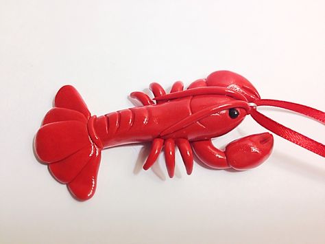 Custom handmade polymer clay Lobster Christmas Ornament. Made on commission. Please see my etsy store for my other creations and to contact me about commissioned work https://www.etsy.com/shop/TempiesMenagerie Polymer Clay Lobster, Polymer Clay Charm Ideas, Clay Lobster, Ceramic Lobster, Fish Decoys, Polymer Clay Fish, Clay Fish, Polymer Clay Kawaii, Sculpture Art Clay