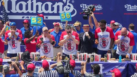 Nathan's hot dog contest: Bertoletti wins after Joey Chestnut debacle Joey Chestnut, Dog Contest, The End Of An Era, Beef Hot Dogs, Best Travel Credit Cards, Build Credit, Women’s Soccer, End Of An Era, Dog Branding