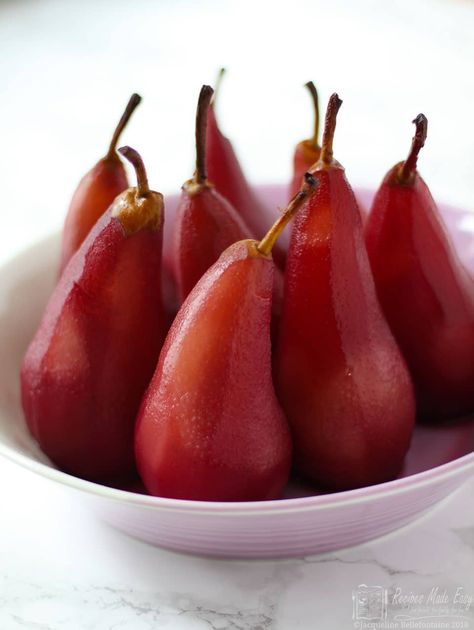 A simple dessert and yet surprisingly decadent. Pears poached in red wine by Recipes Made Easy is an ideal dish to make with pears that are not quite fully ripe. This classic dessert can make the perfect end to a meal. Serve hot or cold with cream or ice cream. Poached Pears Dessert, Red Wine Poached Pears, Pear Recipes Easy, Pears In Red Wine, Poached Pears Recipe, Wine Poached Pears, Red Wine Recipe, Red Desserts, French Dessert Recipes