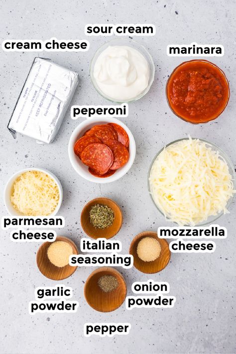 Change up your snack game with Pepperoni Dip! Cream cheese and mozzarella cheese makes it creamy and gooey, and this easy recipe makes it a breeze to prepare. Whether it's game day, a family party, movie night, or just a fun snack night, this pepperoni pizza dip will steal the show! Cream Cheese Pizza Topping, Pepperoni Dip Cream Cheese, Pepperoni Dinner Ideas, Pizza Cheese Ball, Hot Pizza Dip With Cream Cheese, Mdw Food, Pepperoni Cheese Dip, Cream Cheese Pizza Dip, Pizza Dip With Cream Cheese