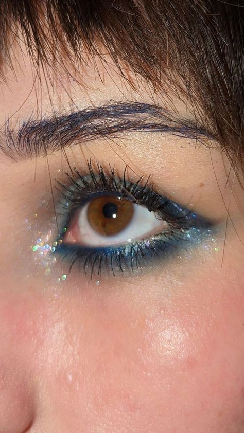 "Oh Christmas brow, oh Christmas brow, how lovely are your arches... Makeup Eye Aesthetic, Brown Eyes Glitter Makeup, Eyeshadow Aesthetic Looks, Blue Make Up Brown Eyes, Beautiful Eye Makeup Glitter, Blue Mascara On Brown Eyes, Eye Makeup Blue Eyeliner, Shiny Blue Makeup, Blue Eye Looks For Brown Eyes