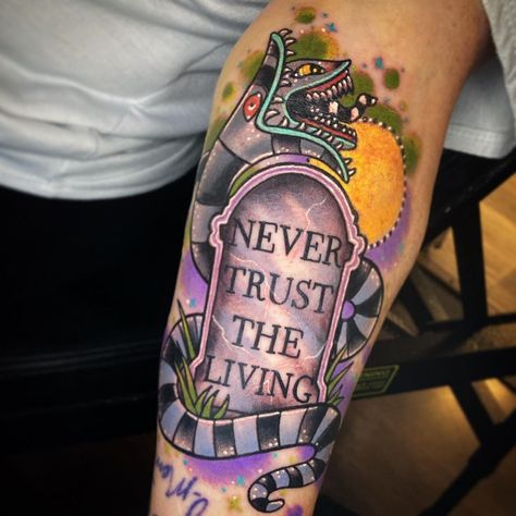 The colors pop so well! 💜 Never Trust the Living, Beetlejuice Inspired tattoo by @nicoleatvoodouxtattoux 🪦🐍 ↓ ↓ ★ ★⁠ ★ TOOFAST.COM ★ ⁠ ★⁠ #beetlejuice #beetlejuicetattoo #halloweentattoo #halloweentattoos #spookytattoos #creepytattoos #gothtattoos #halloweenlovers #halloweenforever #halloweenart #halloweentattooflash #newtraditionaltattoo #tattoohalloween #spookytattoos Never Trust The Living Beetlejuice, Beetlejuice Tattoo, Halloween Tattoos Sleeve, Glow Tattoo, Tim Burton Tattoo, Juice Tattoo, Gothic Tattoos, Horoscope Tattoos, Never Trust The Living