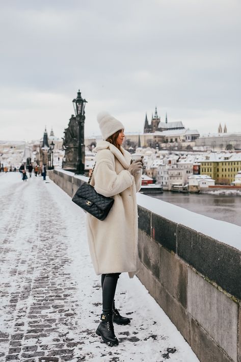 TEDDY BEAR IN SNOWY PRAGUE Prague Winter Fashion, Prague Outfit Winter, Prague Winter Outfit, Prague Outfit, Prague Winter, Max Mara Coat, Louis Vuitton Boots, White Coat, Louis Vuitton Shoes