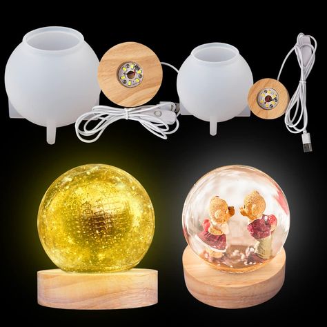 PRICES MAY VARY. 💖Package Incude : 1x 80mm sphere round resin mold+1x 80mm large yellow led light base+1x 65mm sphere round resin mold+1x 60mm white led light base. 💖Size:80mm ball: 3.23*3.07 inch (8.2*7.8cm); 65mm ball: 2.64*2.56 inch (6.7*6.5cm); light base: 80mm: 3.15*0.79 inch (8*2cm); 60mm: 2.36*0.78 inch (6*2cm); the line length is 1.4m. 💖 Diy your own resin lamp : You can make all kinds of beautiful decorative bulbs according to your mood and preferences. You can added some dried flowe Diy Resin Lamp, Flower Sphere, Silicone Molds For Resin, Dandelion Paperweight, Sphere Light, Molds For Resin, Resin Lamp, Ball Lamps, Light Crafts