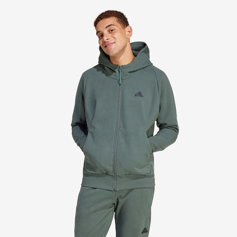 Step up your style in the adidas Sportswear Z.N.E. Winterized FullZip Hoodie in Legend Ivy, the jumper made for the modern explorer, featuring stretchy, brushed fabrics that shield you from the cold while flexing for ease of movement. Designed to blend comfort and style, the adidas Sportswear Z.N.E. Winterized FullZip Hoodie has a loose fit for a relaxed, roomy feel. Moisturewicking AEROREADY moves sweat away from your skin to keep you feeling dry and fresh. Its soft fleece construction feels sm Negative Vibes, Adidas Sweats, Hoodies Men Style, Training Clothes, Vintage Mode, Adidas Hoodie, Adidas Sportswear, Mens Khakis, Athletic Performance