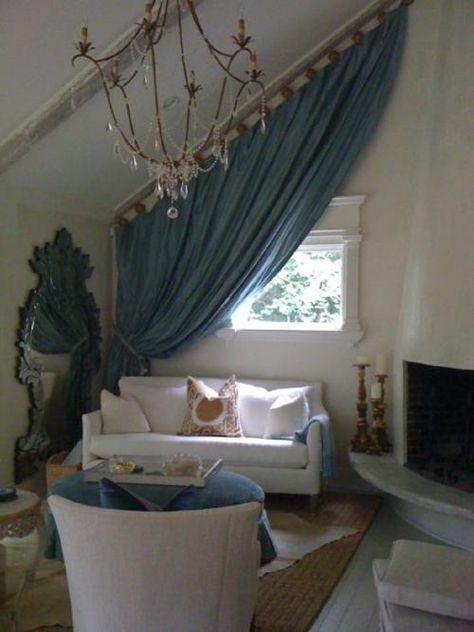 Great way to resolve 'how to hang a shower curtain' in the upstairs bathroom.  I love our slanted roof but it can cause some difficulties. Fabric From Ceiling, Slanted Ceiling Living Room, Small White Sofa, Wall Drapes, Bed Drapes, Slanted Walls, Slanted Ceiling, Ivy House, Cottage Living Rooms