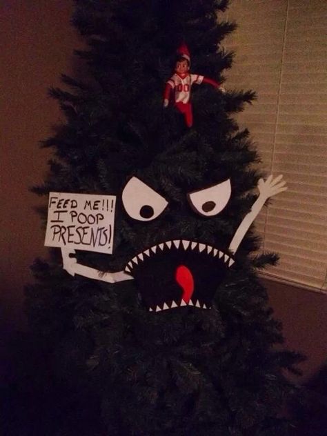 FEED ME! I POOP PRESENTS! (Friend's tree for hide the elf.) - Imgur Scary Expression, Funny Christmas Signs, Elf Returns, Shelf Elf, Funny Christmas Tree, Awesome Elf On The Shelf Ideas, Elf Magic, Xmas Elf, Elf Antics