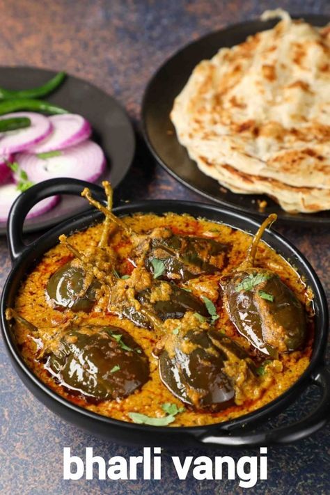 bharli vangi recipe | masala vangi | bharli vangi bhaji | stuffed vangi curry with step by step photo and video recipe. stuffed eggplant based curry recipes are common across india and are used for myriad reasons. basically each state and region of india has its own variation which mainly depends upon the native taste bud. one such hugely popular maharashtrian variation is bharli vangi recipe known for its spice level. Baigan Recipes, Brinjal Curry, Maharashtrian Recipes, Hebbar's Kitchen, Spicy Curry, Aloo Recipes, Curry Ingredients, Bhaji Recipe, Indian Cooking Recipes